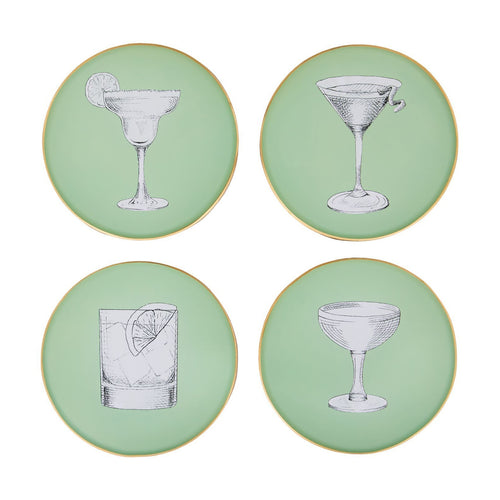 A set of four artisanal, decorative glass coasters, each with a black and white cocktail illustration on a pale sage green background finished with an 18kt gold leaf edging