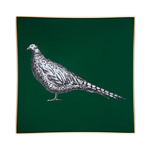 An artisanal, decorative glass valet tray with a pheasant illustration on a dark green background finished with an 18kt gold leaf edging
