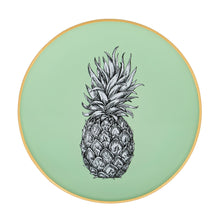 Load image into Gallery viewer, An artisanal, decorative glass round tray with a pineapple illustration on a pale sage green background finished with an 18kt gold leaf edging